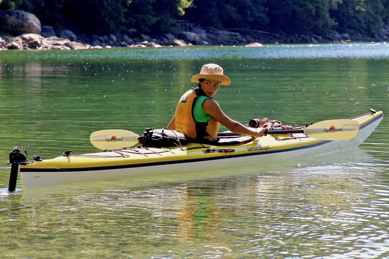 A kayaker launches from our launch site in Okeover Inlet