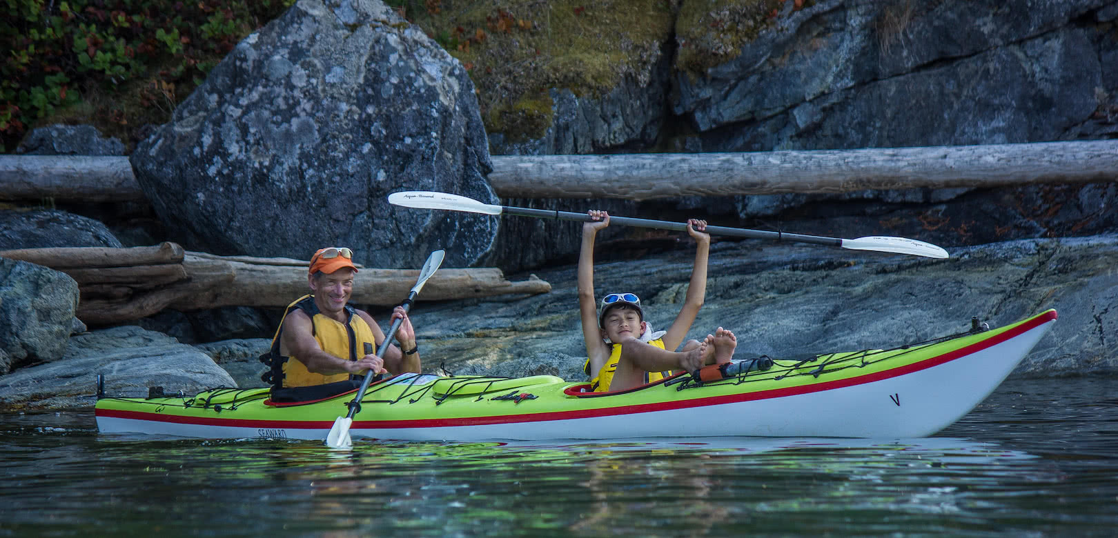 A father and son paddling on one of our multi-day kayak tour