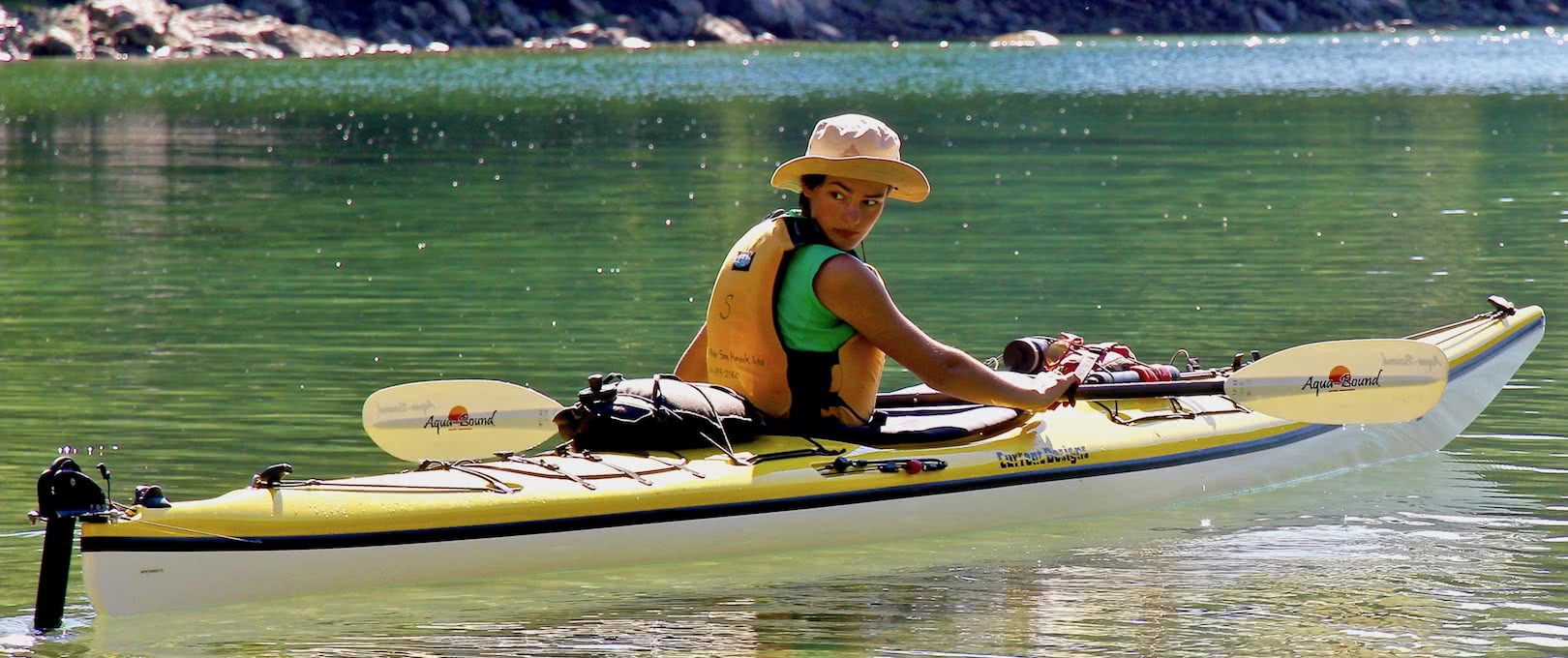 kayaker with sun hat
