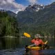 A sea kayaker paddling in Prideaux Haven on one of our sea kayak expeditions