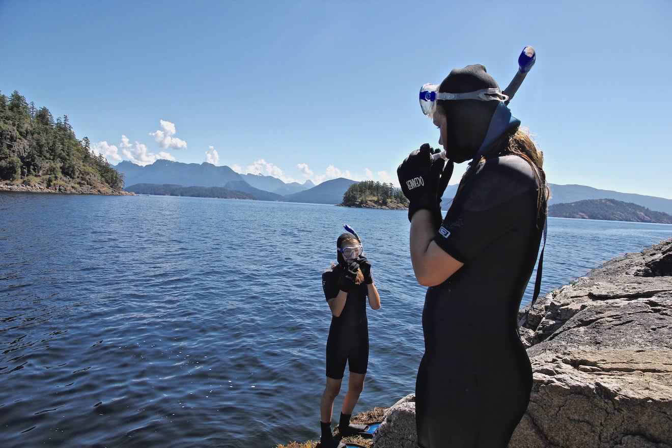 Two young guests get ready to snorkel in Desolation Sound