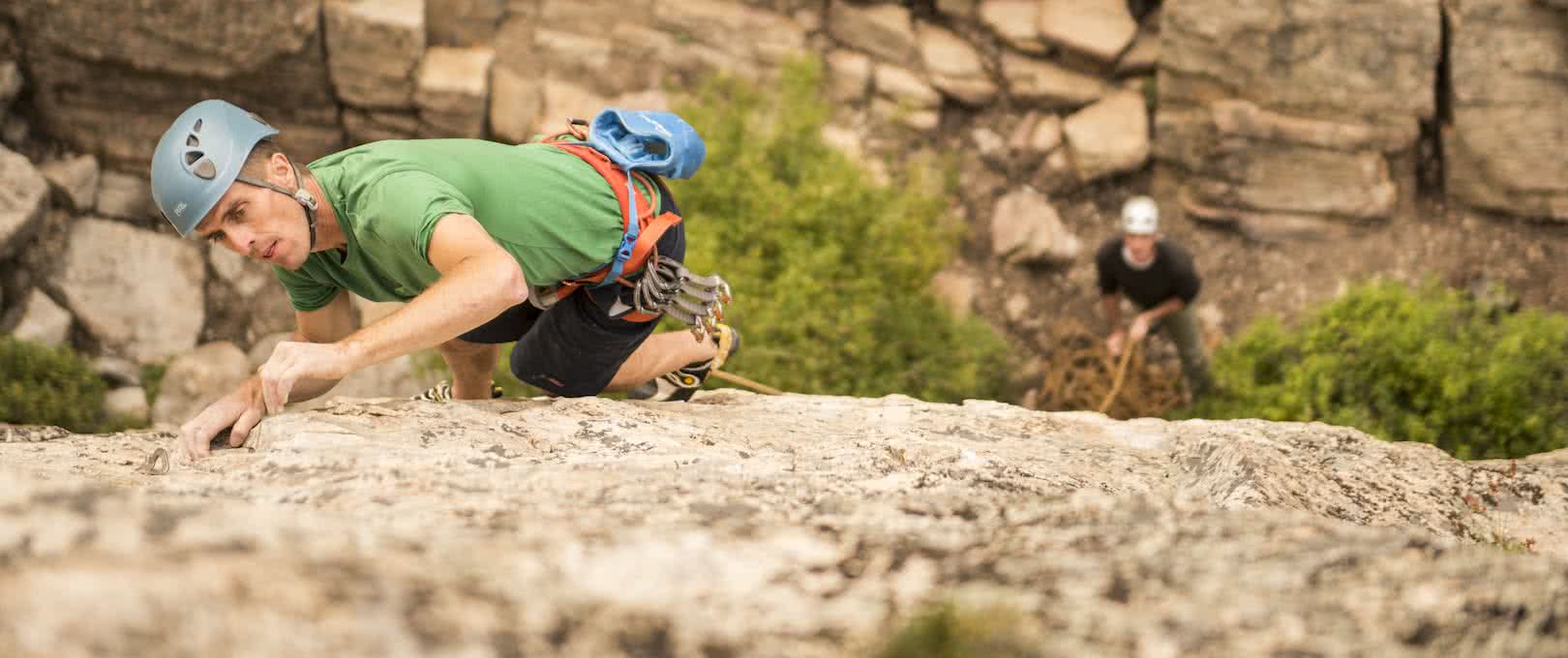 rock climbing and belayer