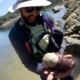 man holding a sea creature