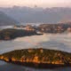 Credit: Destination BC/Andrew Strain. An aerial view of Desolation Sound and the Coast Range Mountains. Mt Denman at centre.