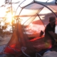 A tent with the sunset at the Copeland Islands