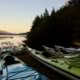 Sea kayaks staged for a day of kayaking in BC in Desolation Sound