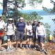 A group at Cabana Desolation Eco Resort standing at the viewpoint of a hike in Desolation Sound