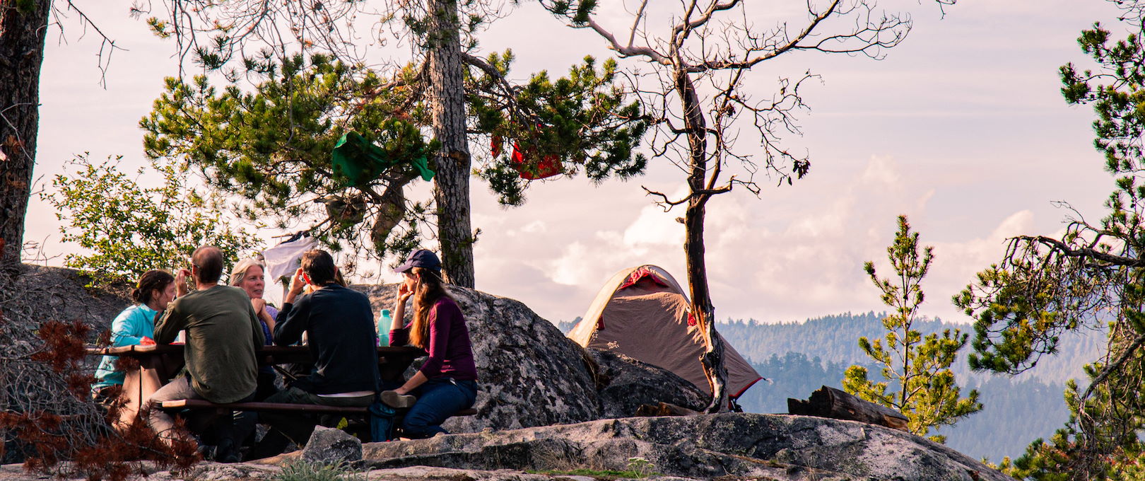 campers sitting at table