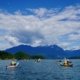 A guided kayak group approaching the snow capped mountains of Toba Inlet