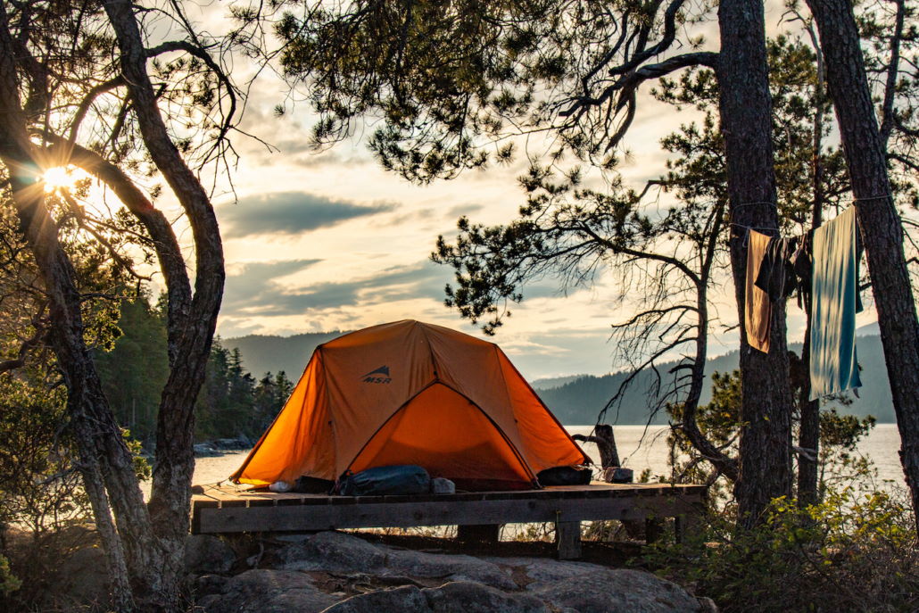 A tent on one of our Desolation Sound vacation kayak camping tours at the Curme Islands