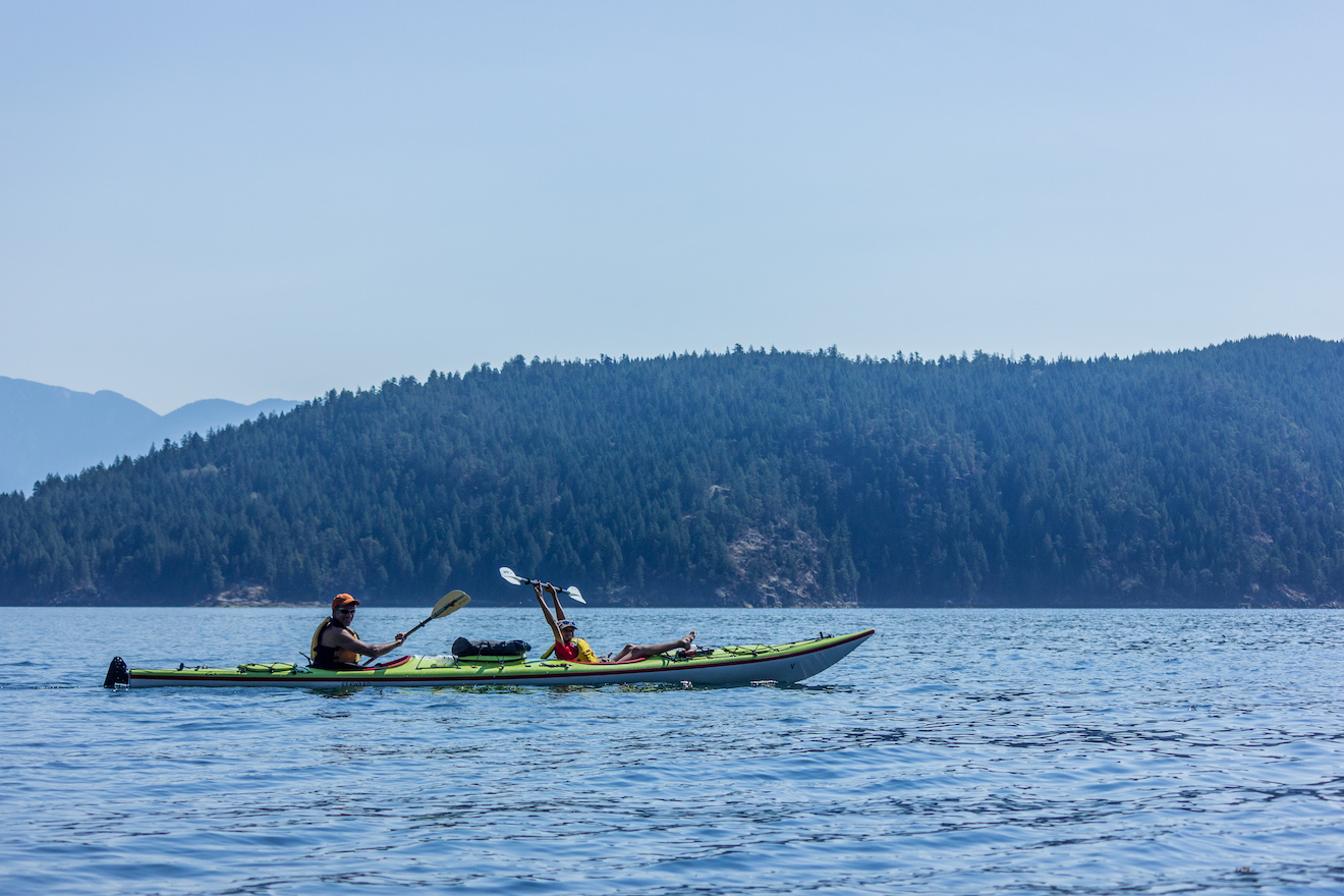 Paddling on a family kayak trip in Desolation Sound