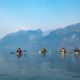 Kayakers on a sea kayak expedition tour in Toba Inlet