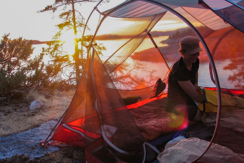 unpacking gear with sunset